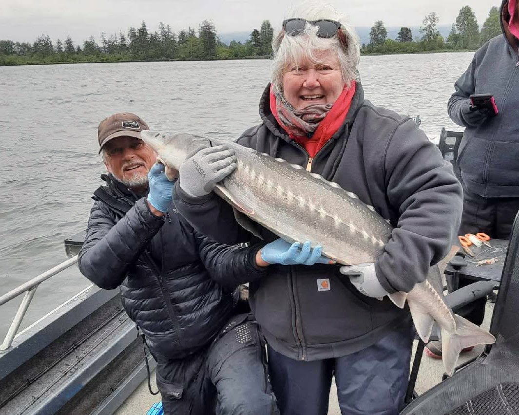 Scott Crawford And Client With Fish Catch