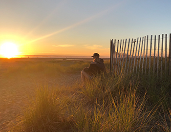 Couple enjoying the sunset together at Seabrook